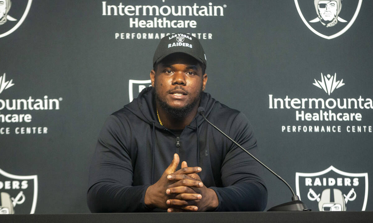 Raiders defensive tackle Bilal Nichols answers questions during a news conference at the Raider ...