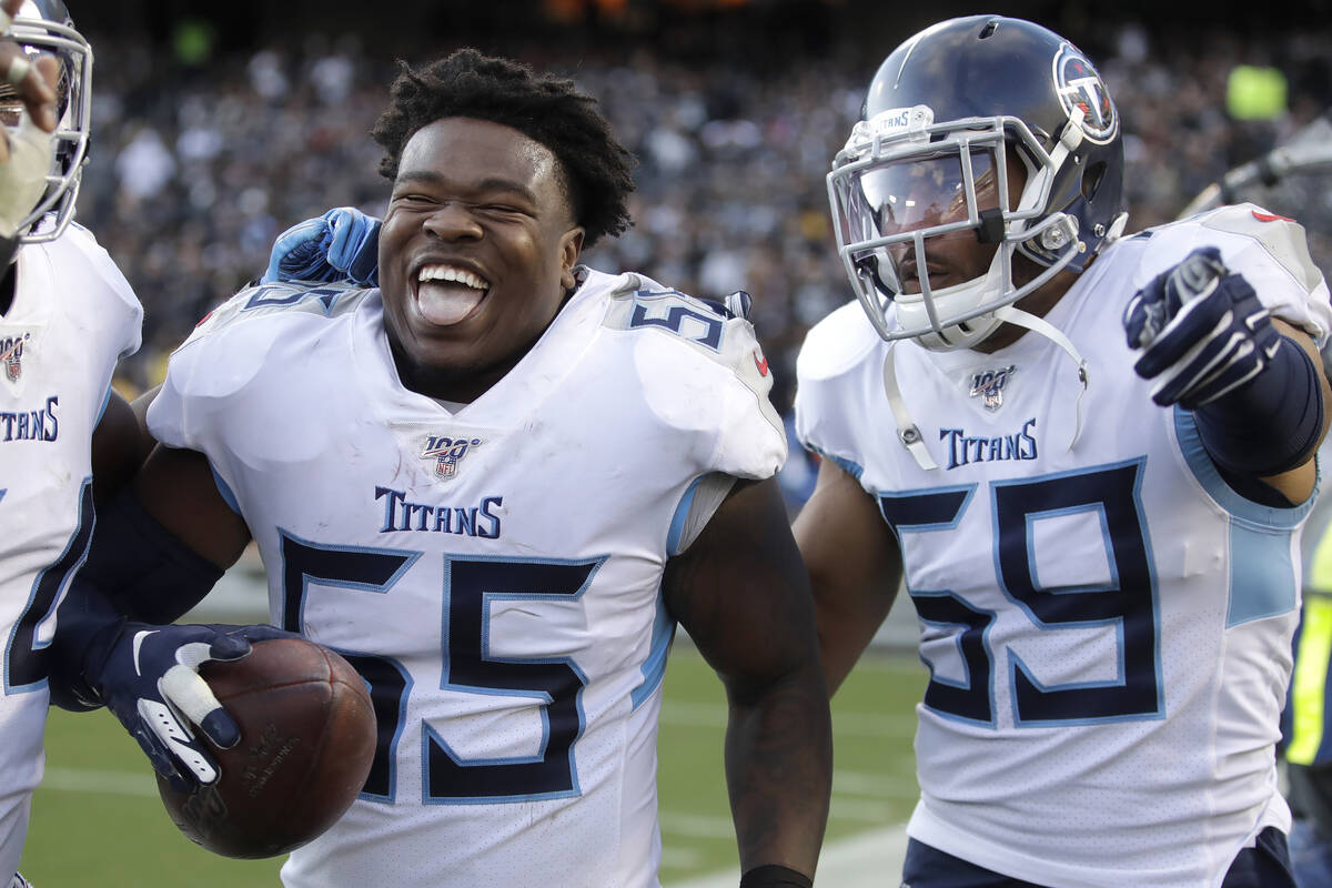 Tennessee Titans inside linebacker Jayon Brown (55) celebrates with inside linebacker Wesley Wo ...
