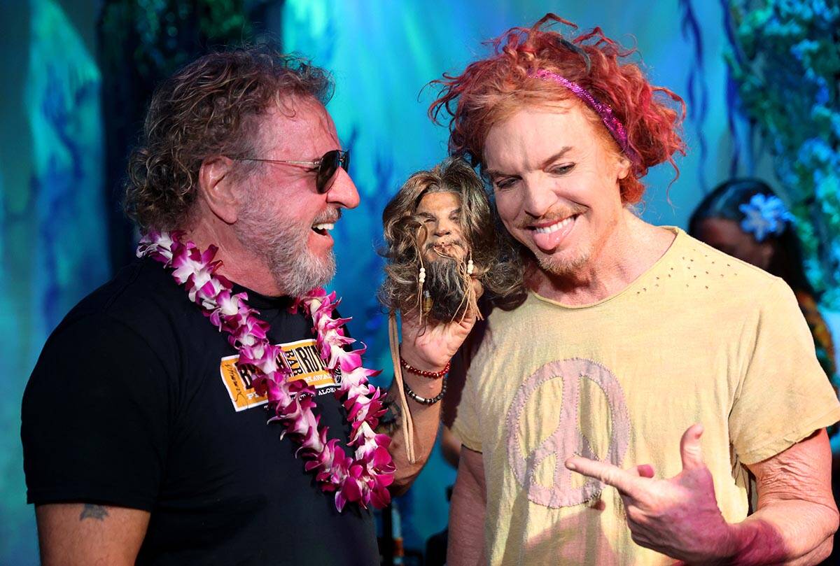 Sammy Hagar, left, shows his shrunken head to Carrot Top during an unveiling ceremony at The Go ...