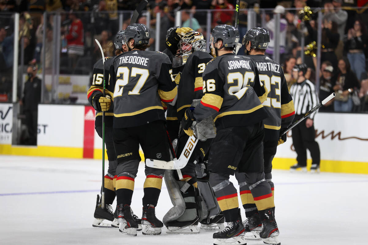 The Vegas Golden Knights celebrate their overtime win against the Chicago Blackhawks NHL hockey ...
