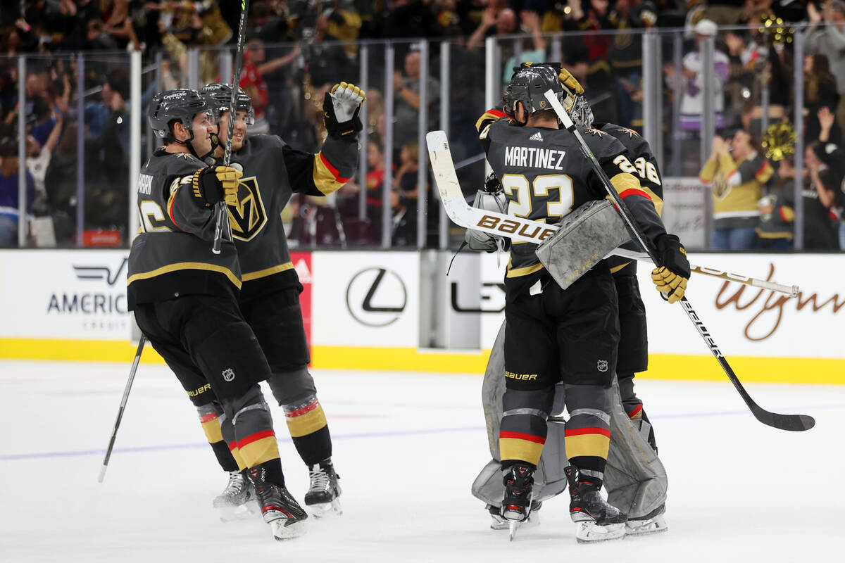 The Vegas Golden Knights celebrate their overtime win against the Chicago Blackhawks NHL hockey ...