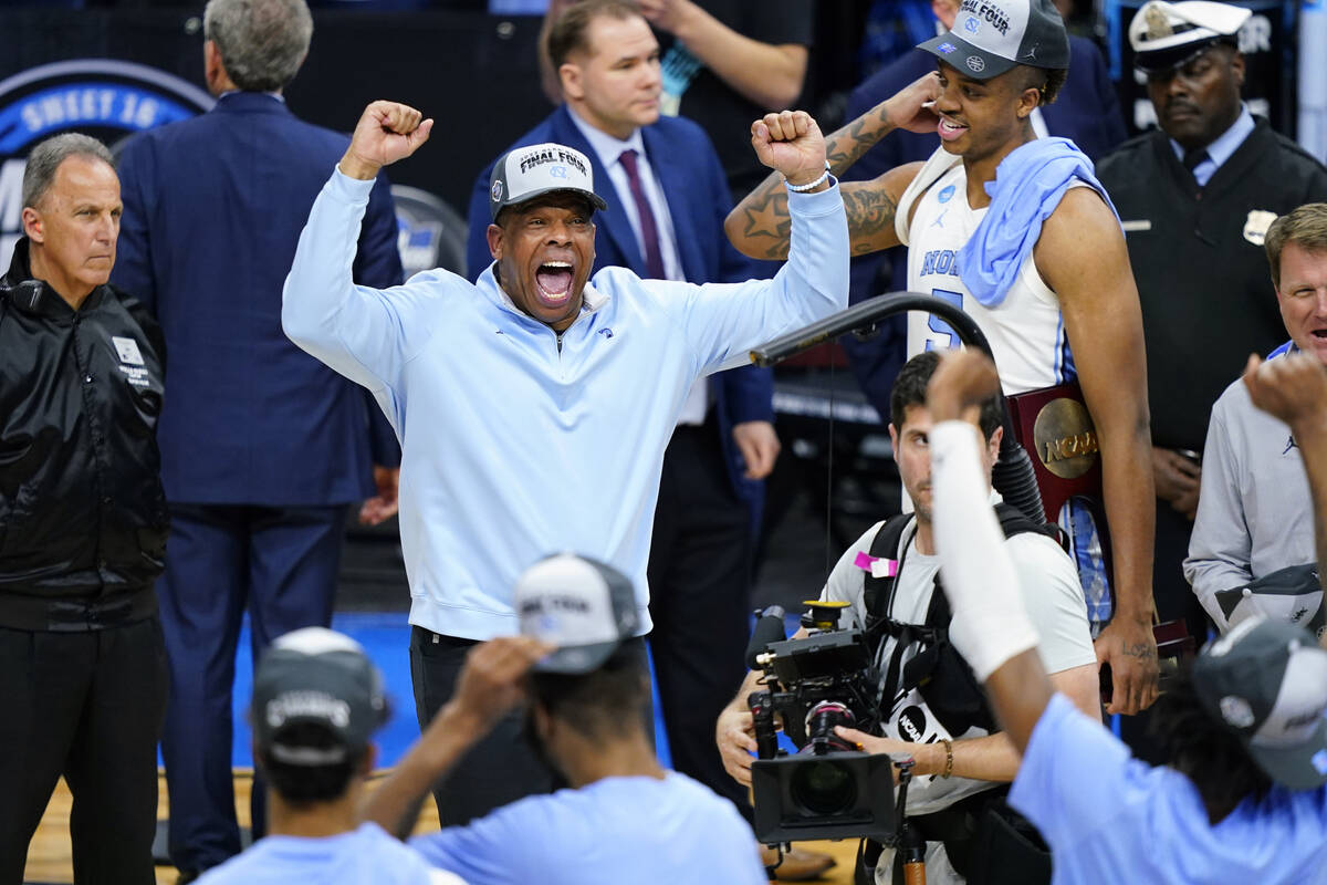 North Carolina head coach Hubert Davis celebrates after North Carolina won a college basketball ...