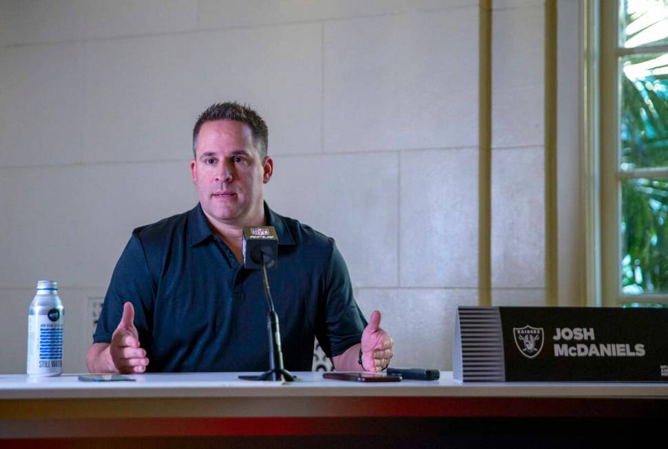 Raiders head coach Josh McDaniels speaks with media at The Breakers Palm Beach hotel-resort dur ...