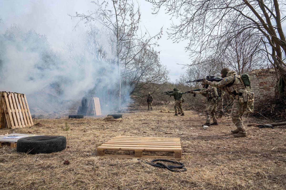 Ukrainian soldiers of the 103rd Separate Brigade of the Territorial Defense of the Armed Forces ...