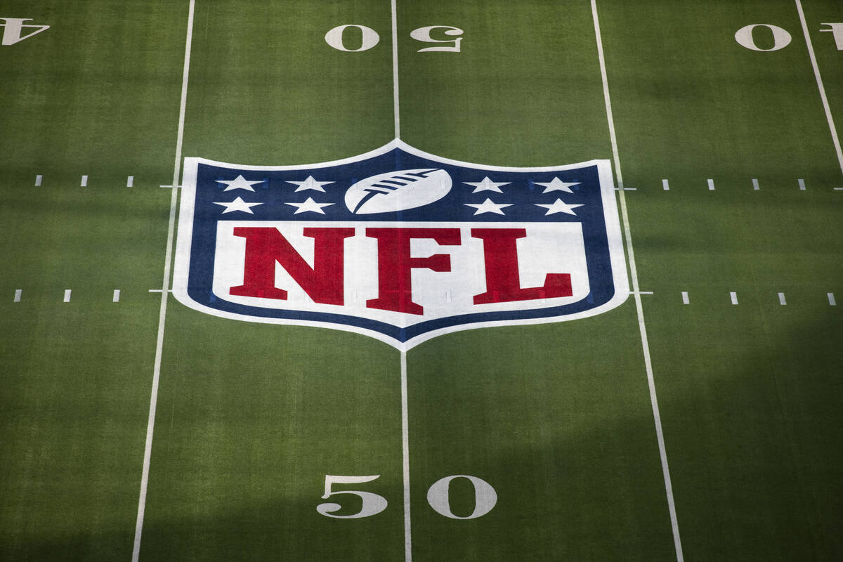 A close up view of the National Football League logo painted on the field prior to the NFL Supe ...