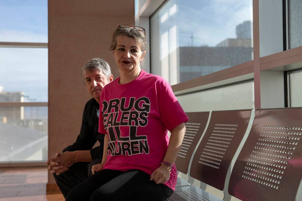 Tom and Mihaela Steyer wait outside of a hearing for Angelo Loza, who is charged with the murde ...