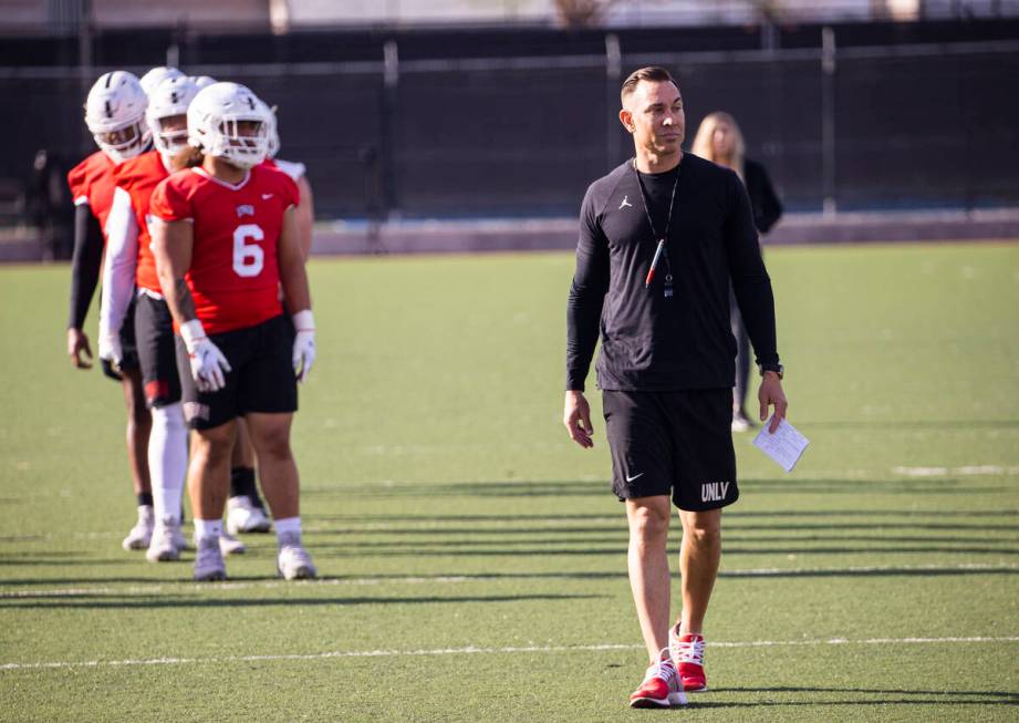 UNLV Rebels head coach Marcus Arroyo looks on during the first day of spring football practice ...