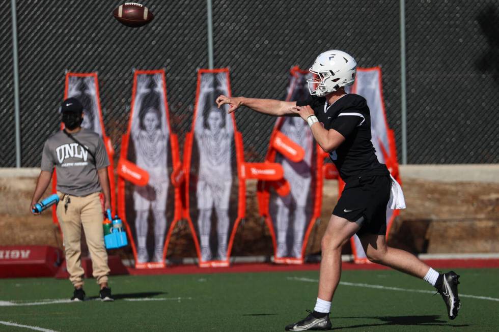 UNLV Rebels quarterback Harrison Bailey throws a pass during the first day of spring football p ...