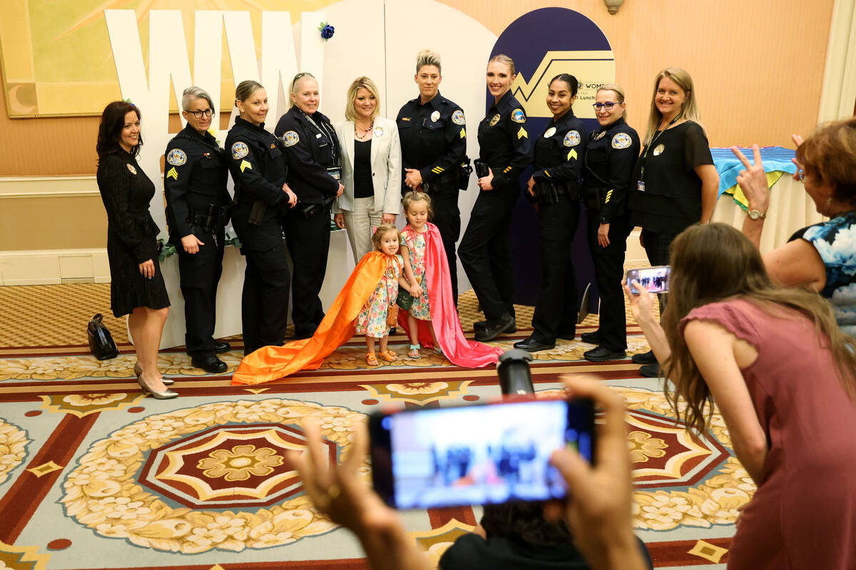 Henderson and Boulder City female police officers are photographed during the Wonder Women of M ...