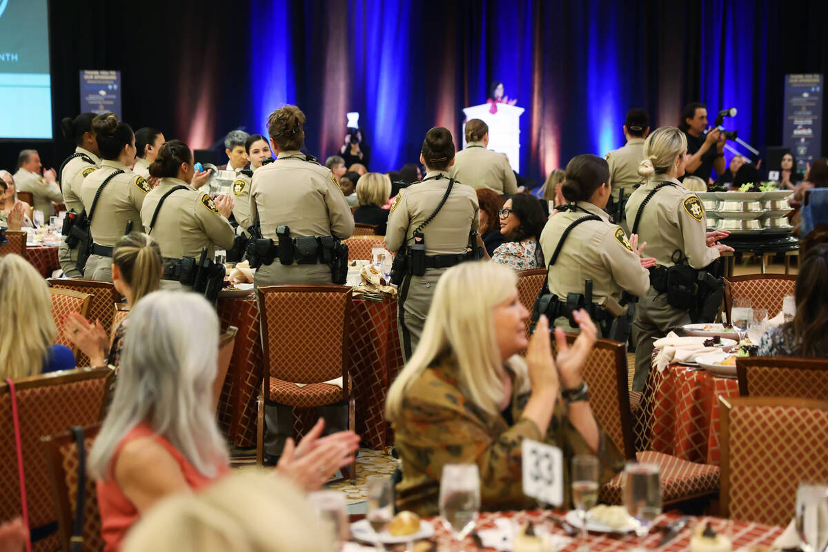 Female police officers are recognized during the Wonder Women of Metro Luncheon at the Caesars ...