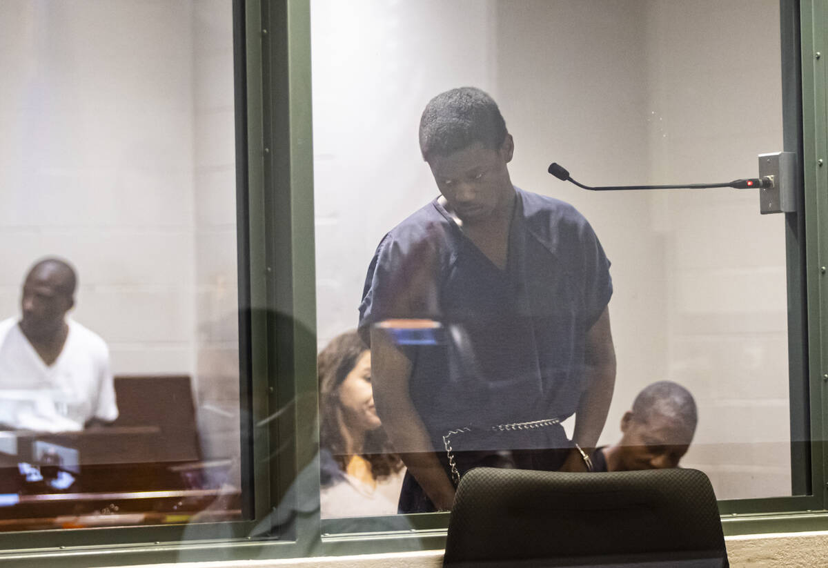 Dennis Commodore looks down during his initial appearance at the Regional Justice Center on Wed ...