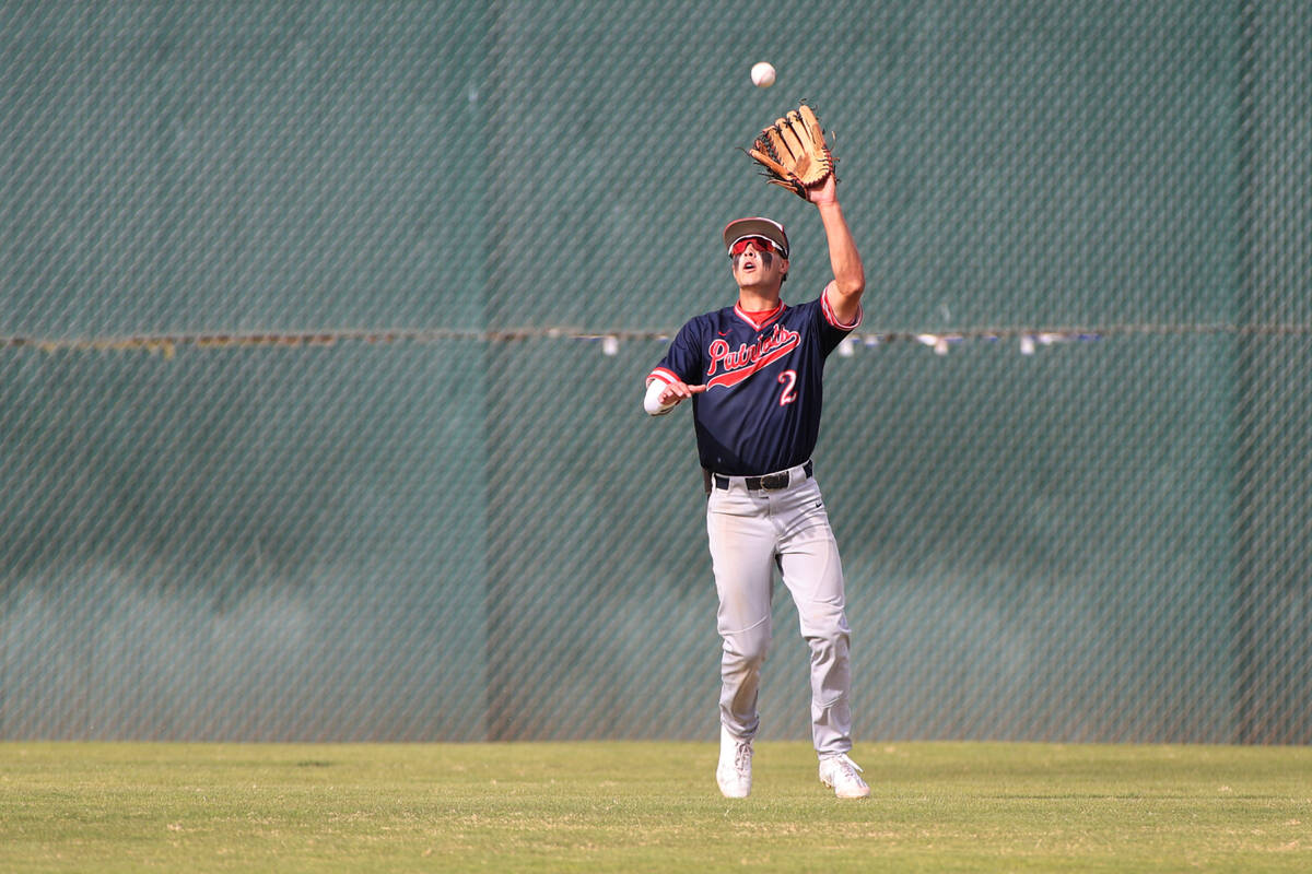 Liberty’s Brett Matson (2) makes an outfield catch for an out during a baseball game aga ...