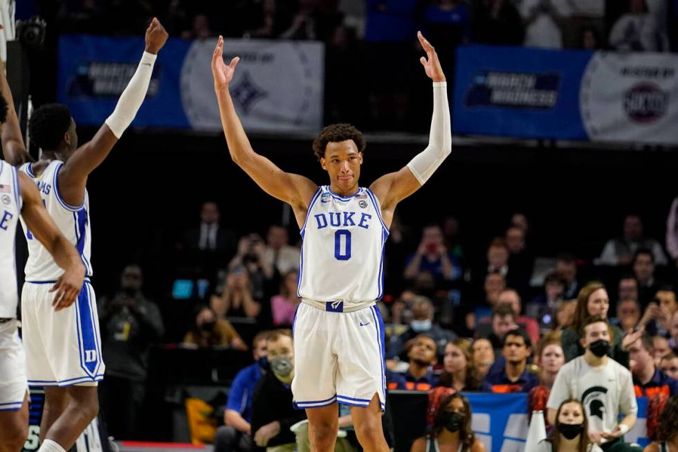 Duke's Wendell Moore Jr. (0) celebrates after a win against Michigan State in a college basketb ...