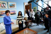 Sen. Susan Collins, R-Maine, left, talks to media as she meets with Supreme Court nominee Ketan ...