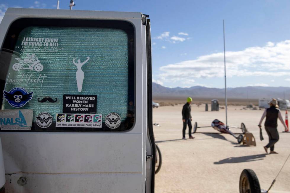 A sticker reading "well behaved women rarely make history" adorns Renee Fields' van while she a ...