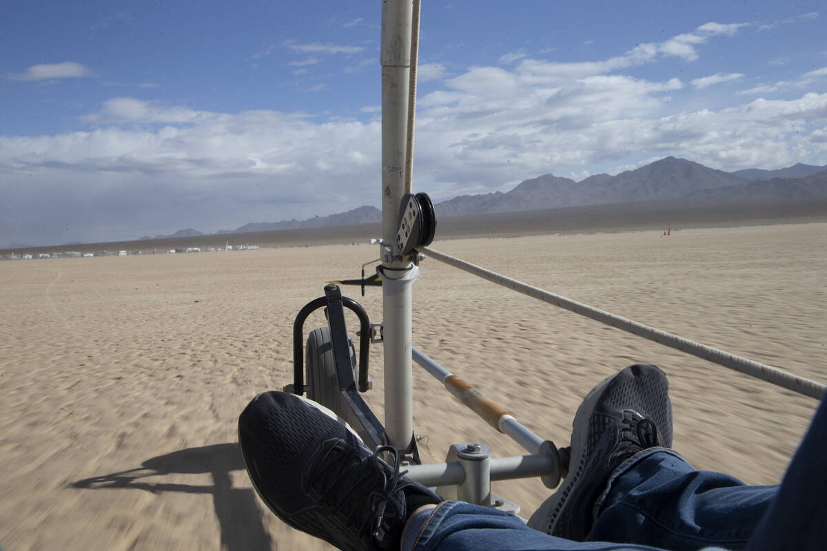 Renee Fields takes her Manta twin land yacht for a ride before races begin at Ivanpah Dry Lake ...