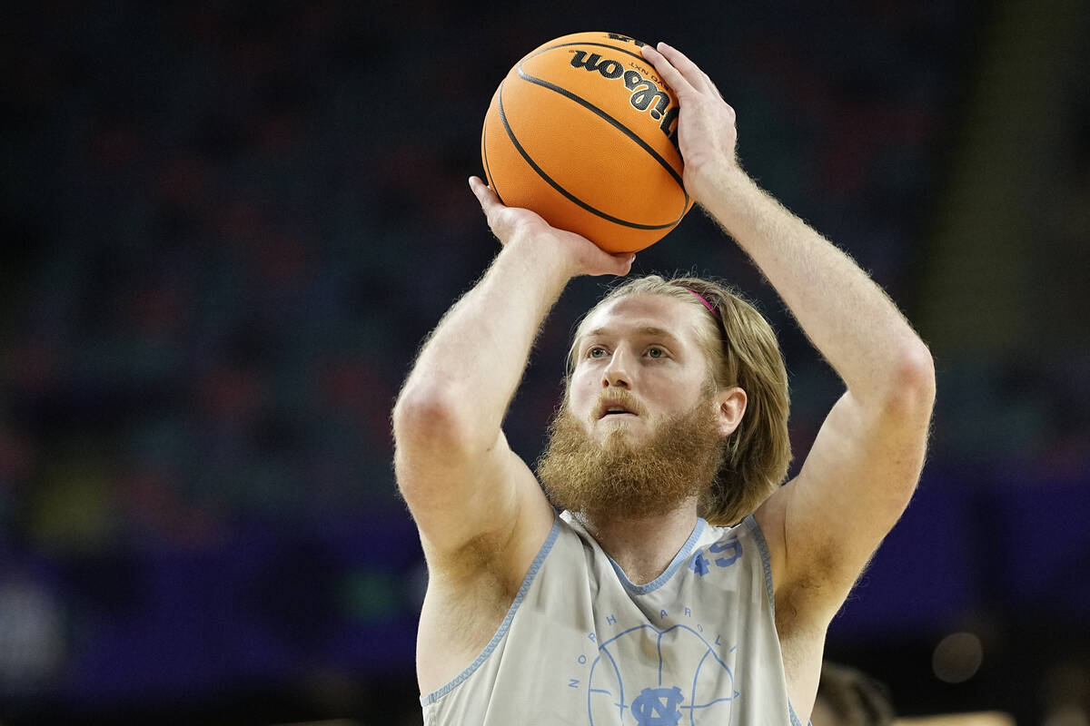 North Carolina forward Brady Manek shoots during practice for the men's Final Four NCAA college ...