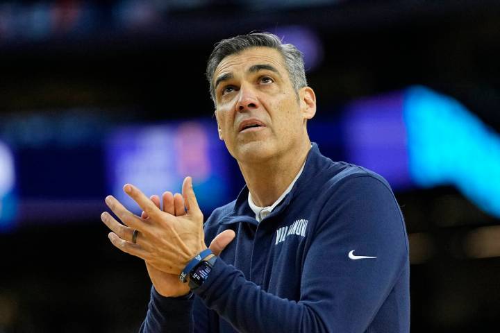 Villanova head coach Jay Wright watches during practice for the men's Final Four NCAA college b ...