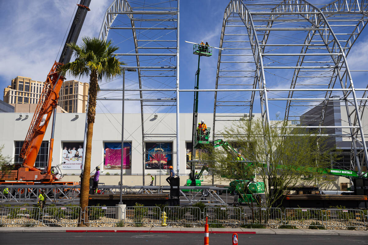 Workers begin to build out the NFL Draft Theater at Caesars Forum on Monday, April 4, 2022, in ...