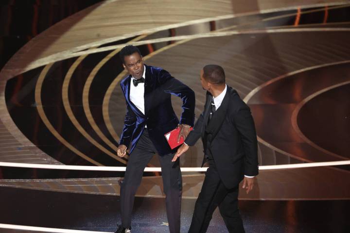 Chris Rock, left, and Will Smith onstage during the 94th Academy Awards at the Dolby Theatre on ...