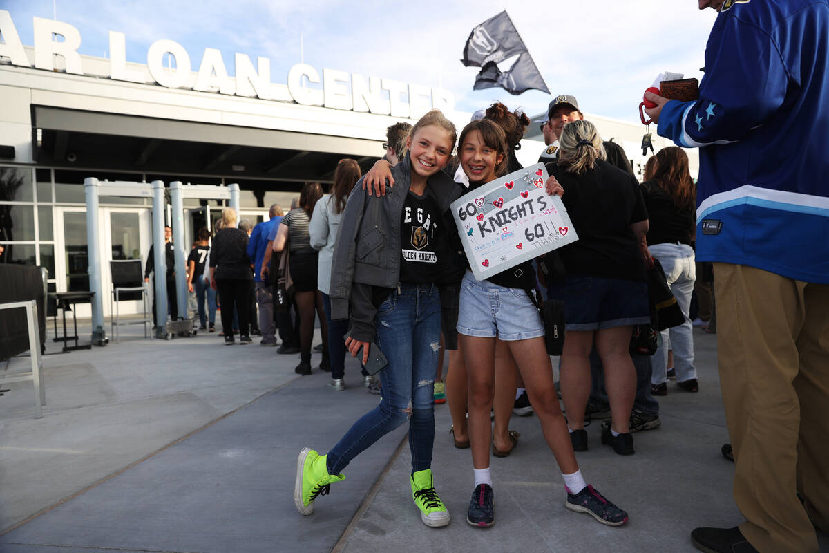 Fans outside of The Dollar Loan Center in Henderson before the start of an AHL game between the ...