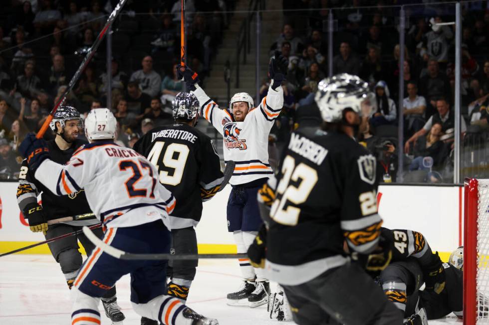 Bakersfield Condors Brendan Perlini (42) raises his arms after a goal against the Henderson Sil ...