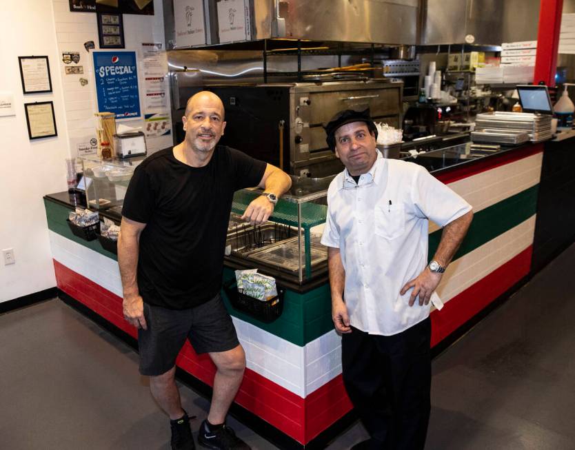 Brett Raymer, left, co-owner of Stallone's Italian Eatery and Chef Louie Zweifach pose for a ph ...