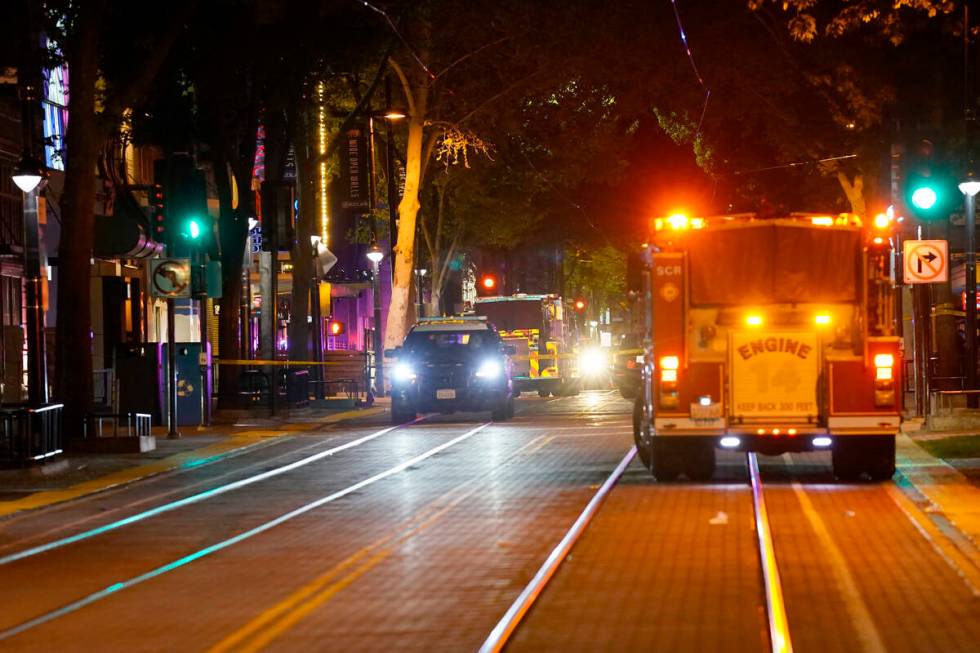 Emergency vehicles line the street near the scene of a mass shooting with multiple deaths in Sa ...