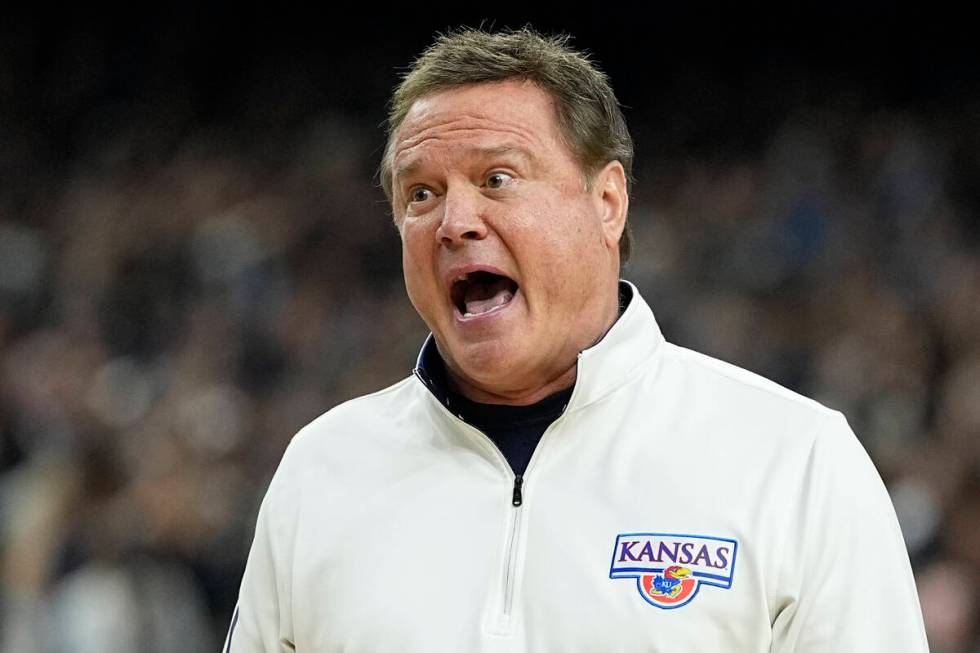 Kansas head coach Bill Self yells during the first half of a college basketball game against Vi ...