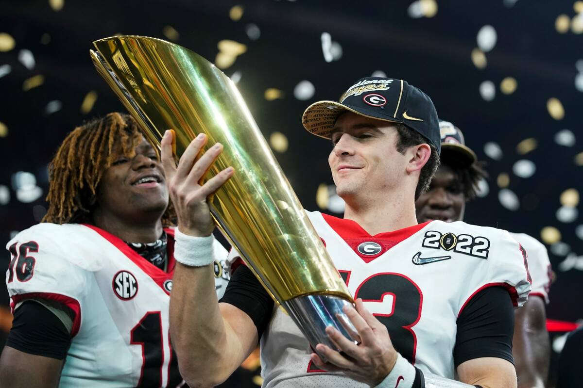 Georgia's Stetson Bennett celebrates after the College Football Playoff championship football g ...