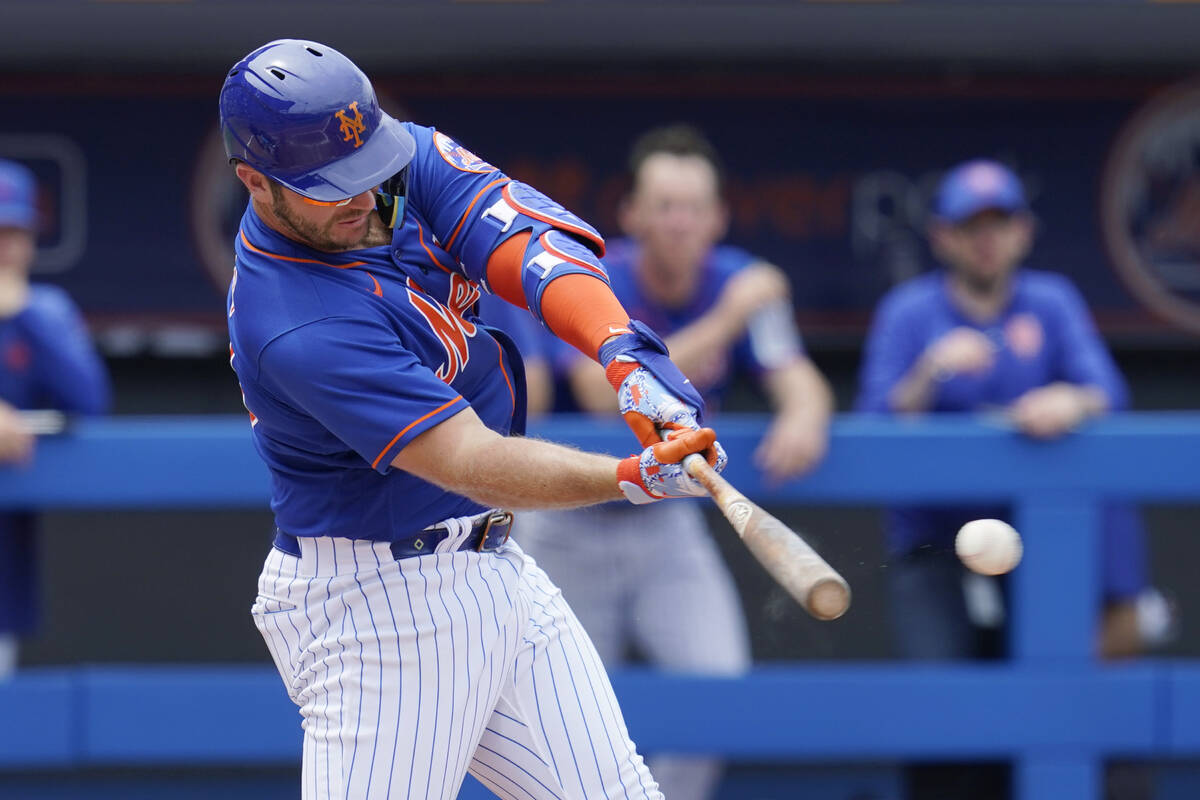 New York Mets' Pete Alonso hits a double during the third inning of the team's spring training ...