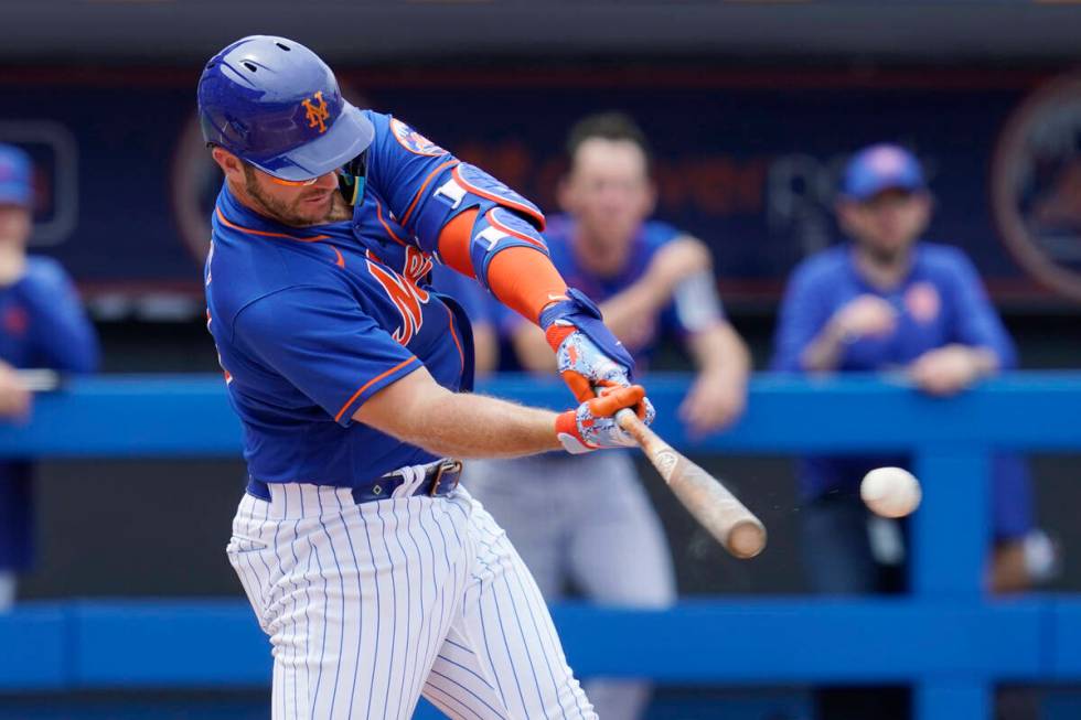New York Mets' Pete Alonso hits a double during the third inning of the team's spring training ...