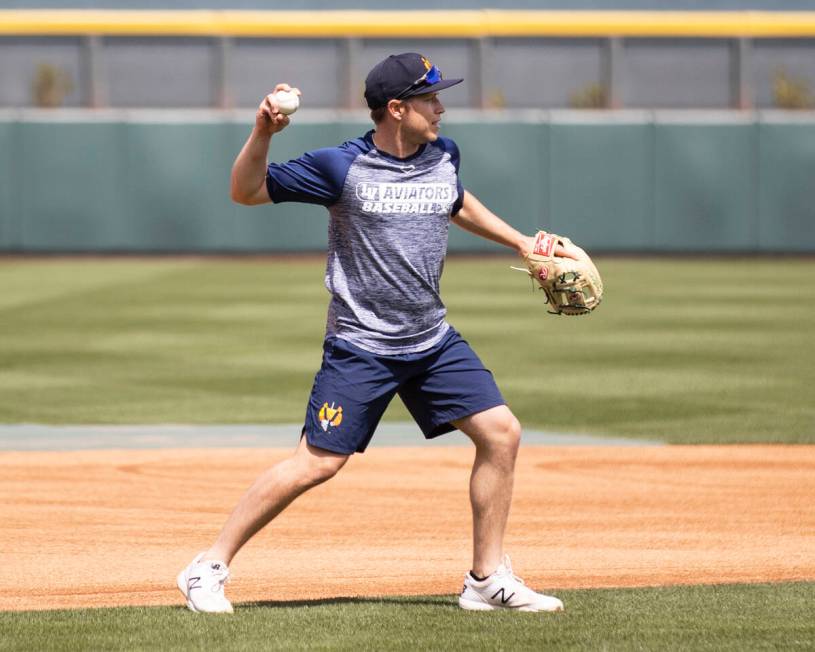 The Las Vegas Aviators infielder Nick Allen (2) throws the ball during media day practice at th ...