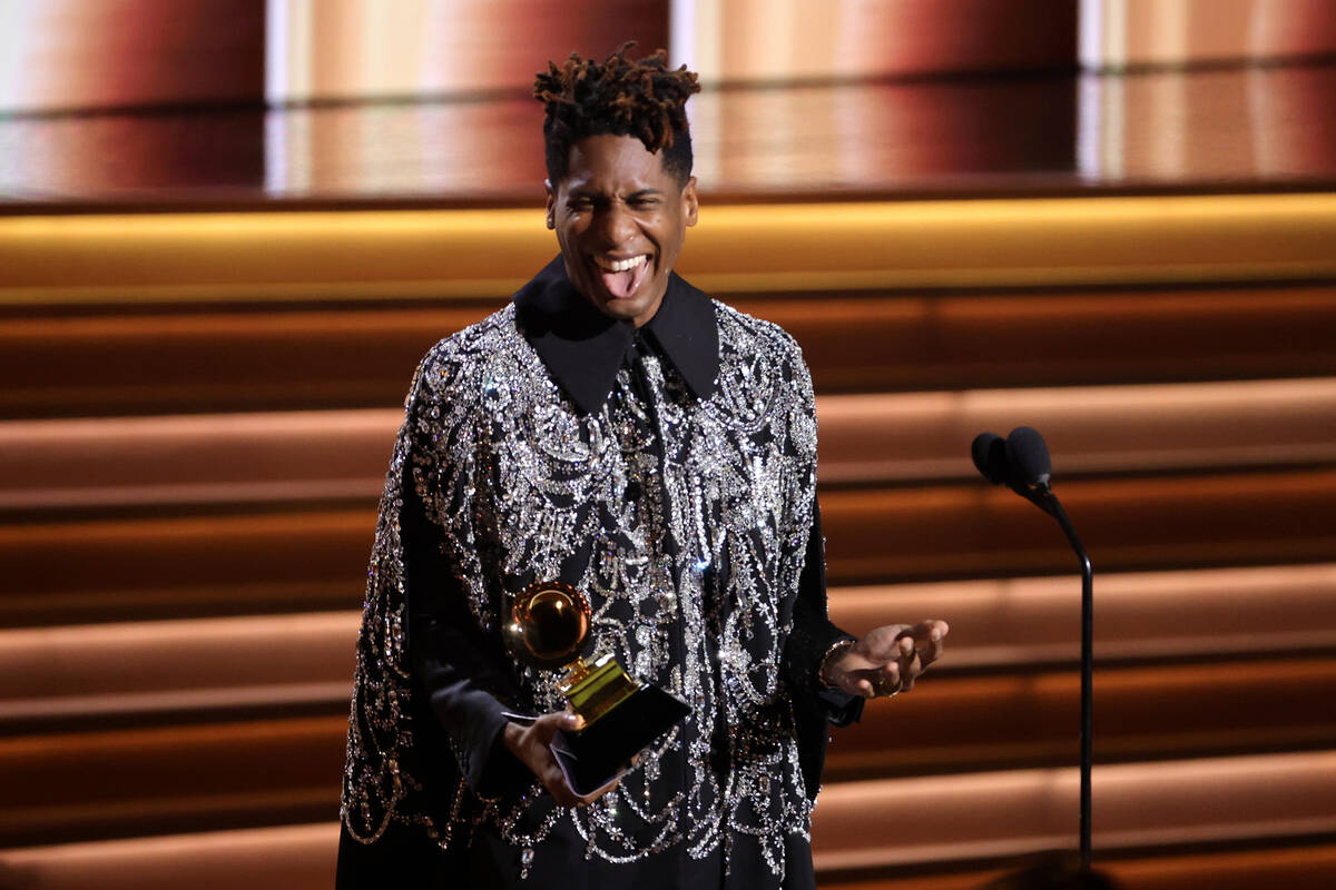 Jon Batiste accepts the Album of the Year award for “We Are” onstage during the 64th Annual ...