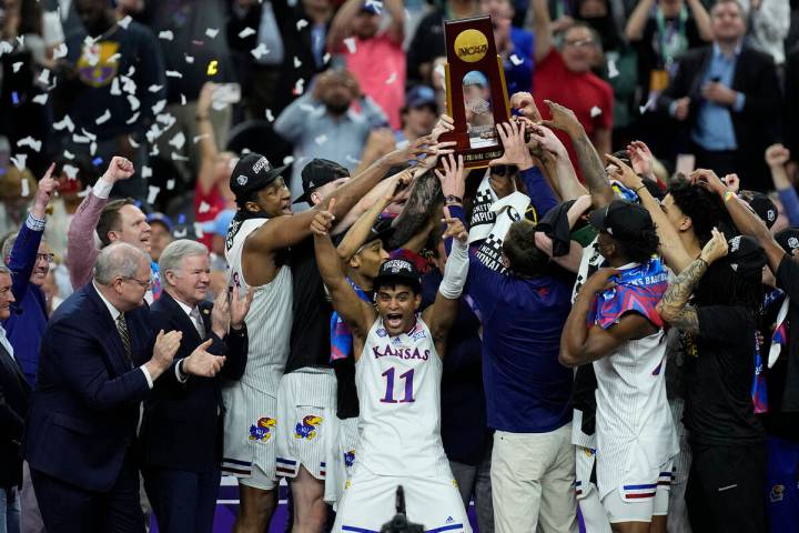 Kansas guard Remy Martin (11) celebrates after a college basketball game against North Carolina ...