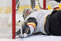 Vegas Golden Knights goalie Robin Lehner stretches across the goal line as the puck goes wide o ...