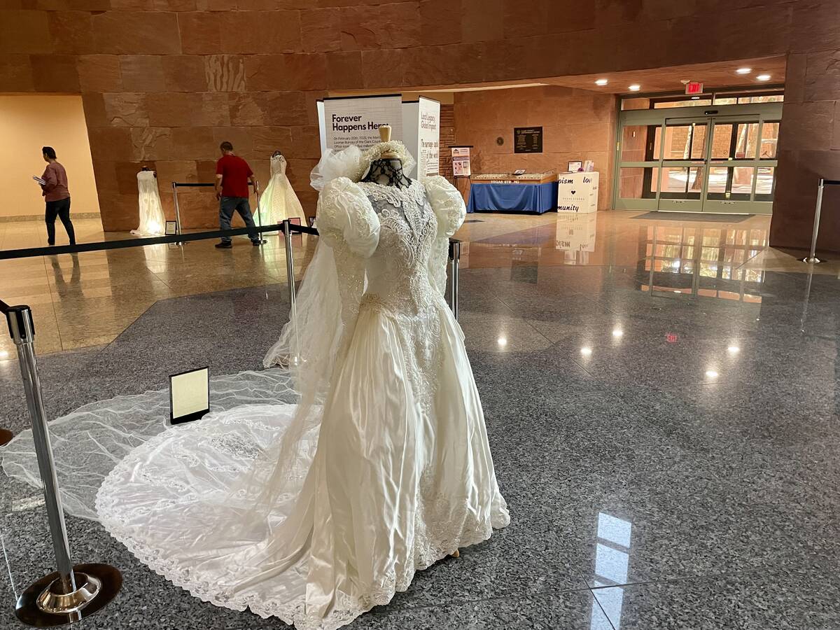 A 1980s-style wedding dress sits on display on Tuesday, April 5, 2022, at the Clark County Gove ...