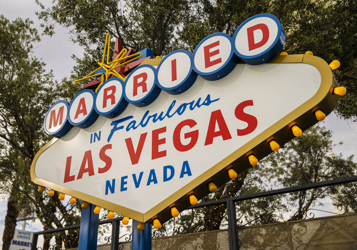The new wedding-inspired version of the "Welcome to Fabulous Las Vegas" sign at Chape ...