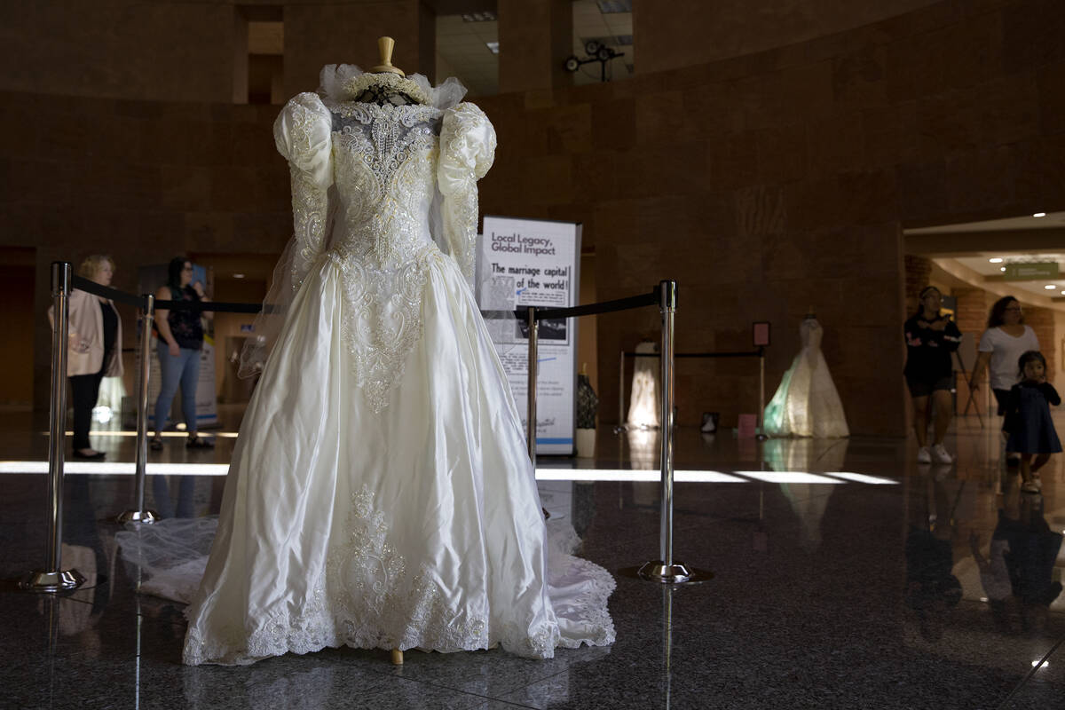 A vintage 1980s wedding dress is on display as part of a historical wedding exhibit in the rotu ...