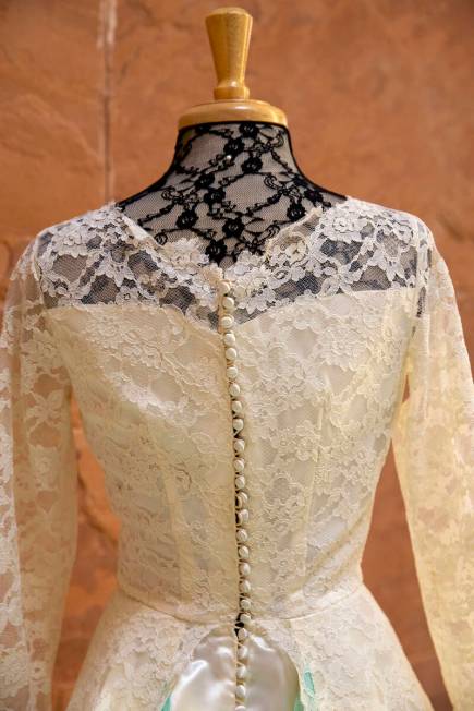 A vintage 1950s wedding dress is on display as part of a historical wedding exhibit in the rotu ...