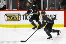 Golden Knights' Max Pacioretty (67) skates with the puck alongside Mark Stone (61) during a scr ...