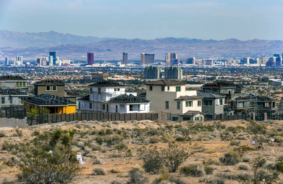 New homes under construction near West Reedpoint Drive and Desert Foothills Drive on Wednesday, ...