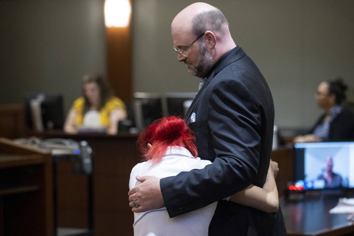 Jasmin Vargas, left, embraces defense attorney Augustus Claus during her sentencing hearing at ...