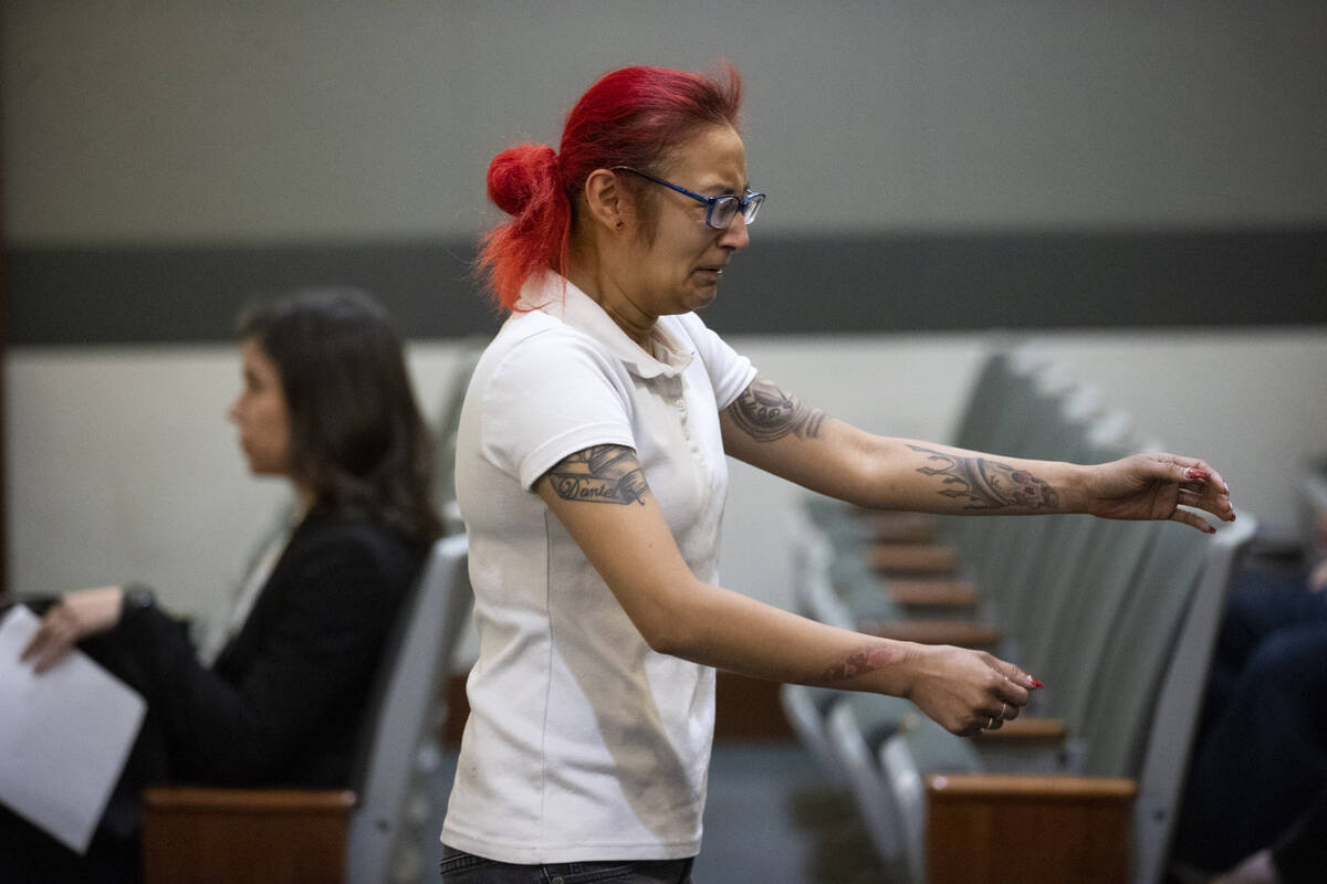 Jasmin Vargas extends her arms to embrace her fiancé, not pictured, after being sentenced to p ...