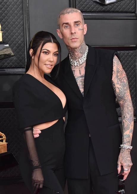 Kourtney Kardashian, left, and Travis Barker appear at the 64th Annual Grammy Awards in Las Veg ...