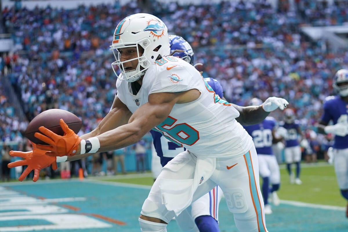 Miami Dolphins wide receiver Mack Hollins (86) catches a pass in the end zone for a touchdown d ...