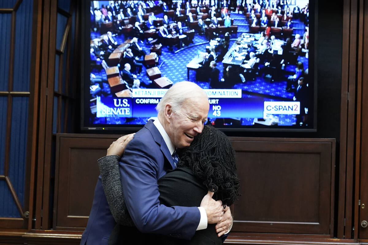 President Joe Biden hugs Supreme Court nominee Judge Ketanji Brown Jackson as they watch the Se ...