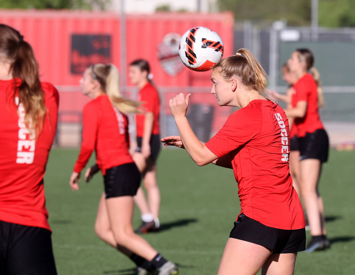 Defender Natalie Rouse heads the ball during UNLV women’s soccer practice at Peter Johan ...