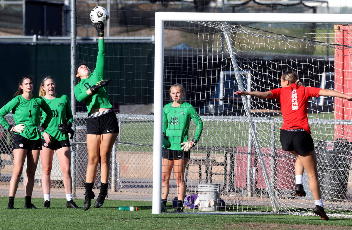 Goalkeeper Riley Liebsack blocks a shot during UNLV women’s soccer practice at Peter Joh ...