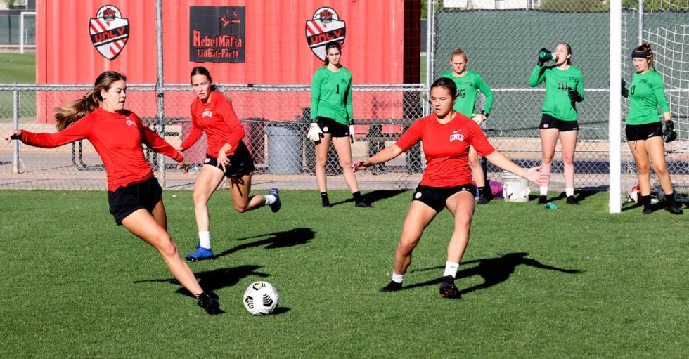 Forward Alysa Caso, from left, defender Heather Mitchell and midfielder Haley Halbersma during ...